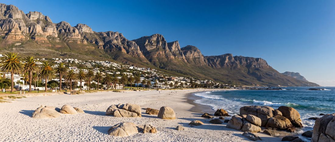 Wide view of Camps Bay Beach, Cape Town, South Africa.