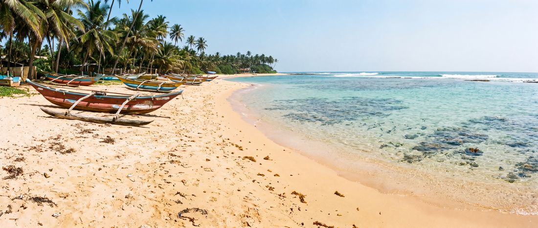 Wide view of Hikkaduwa Beach, Southern Province.