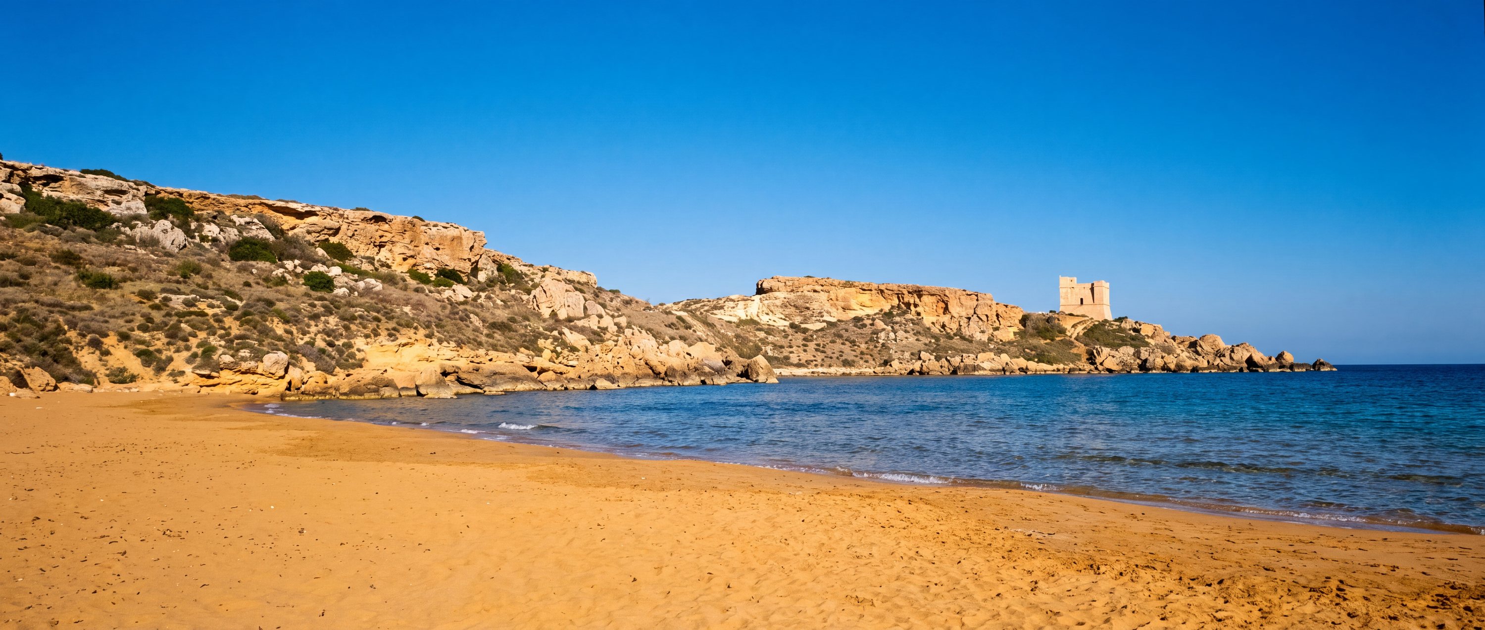 Wide view of Golden Bay, Mellieha, Malta.