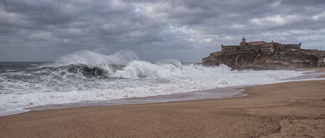 Wide view of Praia do Norte, Nazare, Portugal.