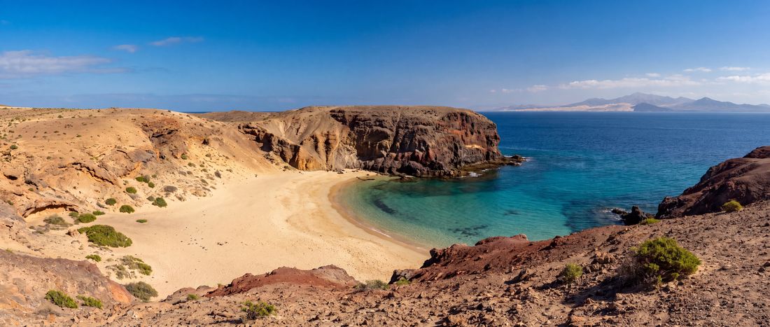 Wide view of Playa de Papagayo, Lanzarote, Canary Islands.