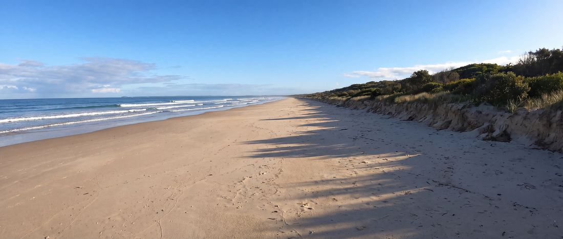 Wide view of Seven Mile Beach, New South Wales, Australia.