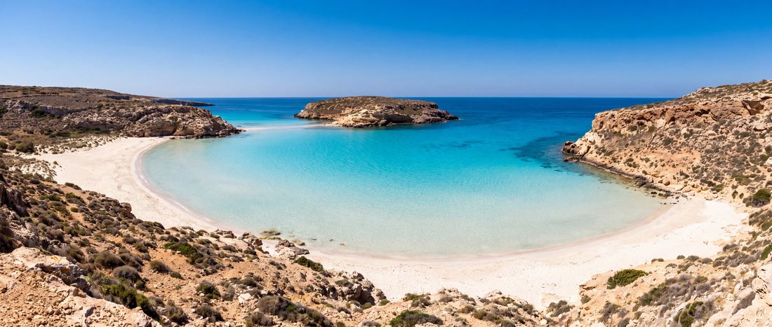 Wide view of Spiaggia dei Conigli, Lampedusa, Italy.