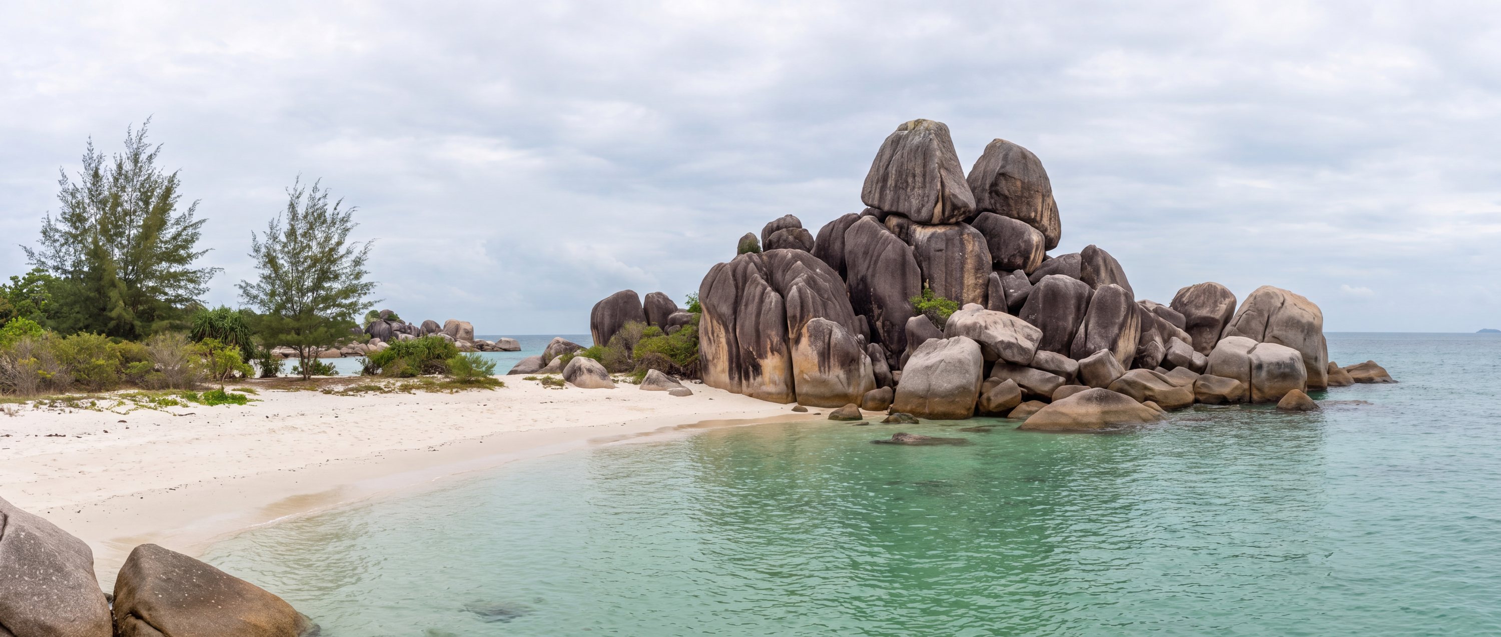 Wide view of Tanjung Tinggi Beach, Bangka Belitung Islands.