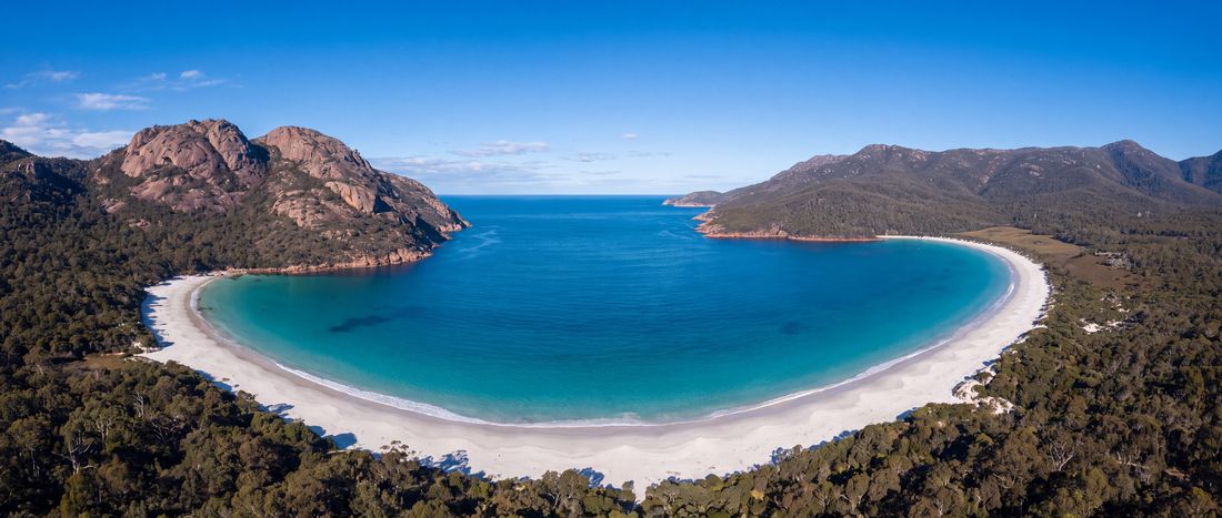 Wide view of Wineglass Bay, Freycinet, Tasmania.